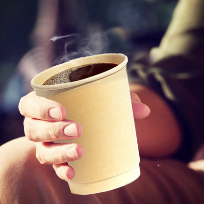 Person holding a 12oz Compostable Hot Chocolate Cups 